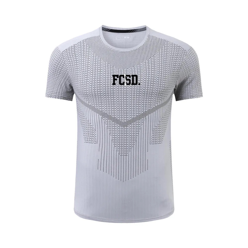 Camiseta técnica gris con patrón de puntos FCSD.